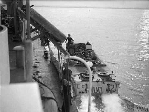 Assault landing craft leaving an infantry carrying craft (mother ship).