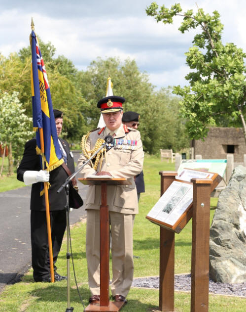 General Barrons delivering his speech at the dedication ceremony