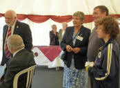 Socialising in the marquee before the dedication ceremony.