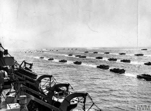 A fleet of Landing Craft Assaul (LCA)  passing a landing ship during exercises prior to the invasion of Normandy. 