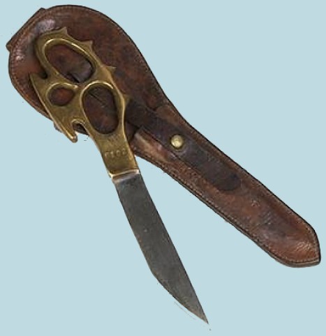 Knuckle-duster knife produced during 1940-41 for use by members of 50, 51 and 52 Commandos. These three Commandos were raised in the Middle East and the knives were made locally in Egypt.