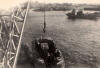 HMS Thruster - Landing Ship Tank. Landng Craft Personnel being lowered into the water at Piraeus.