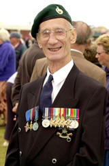 Bill Sparks, one of the Cockleshell Heroes in later life proudly wearing his many medals.